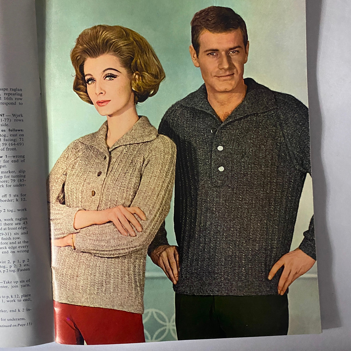 Inside page of '1963 Cable Knits for Men & Women' showcasing a woman in a light gray ribbed sweater and a man in a contrast gray polo, representing classic 1960s knitwear.