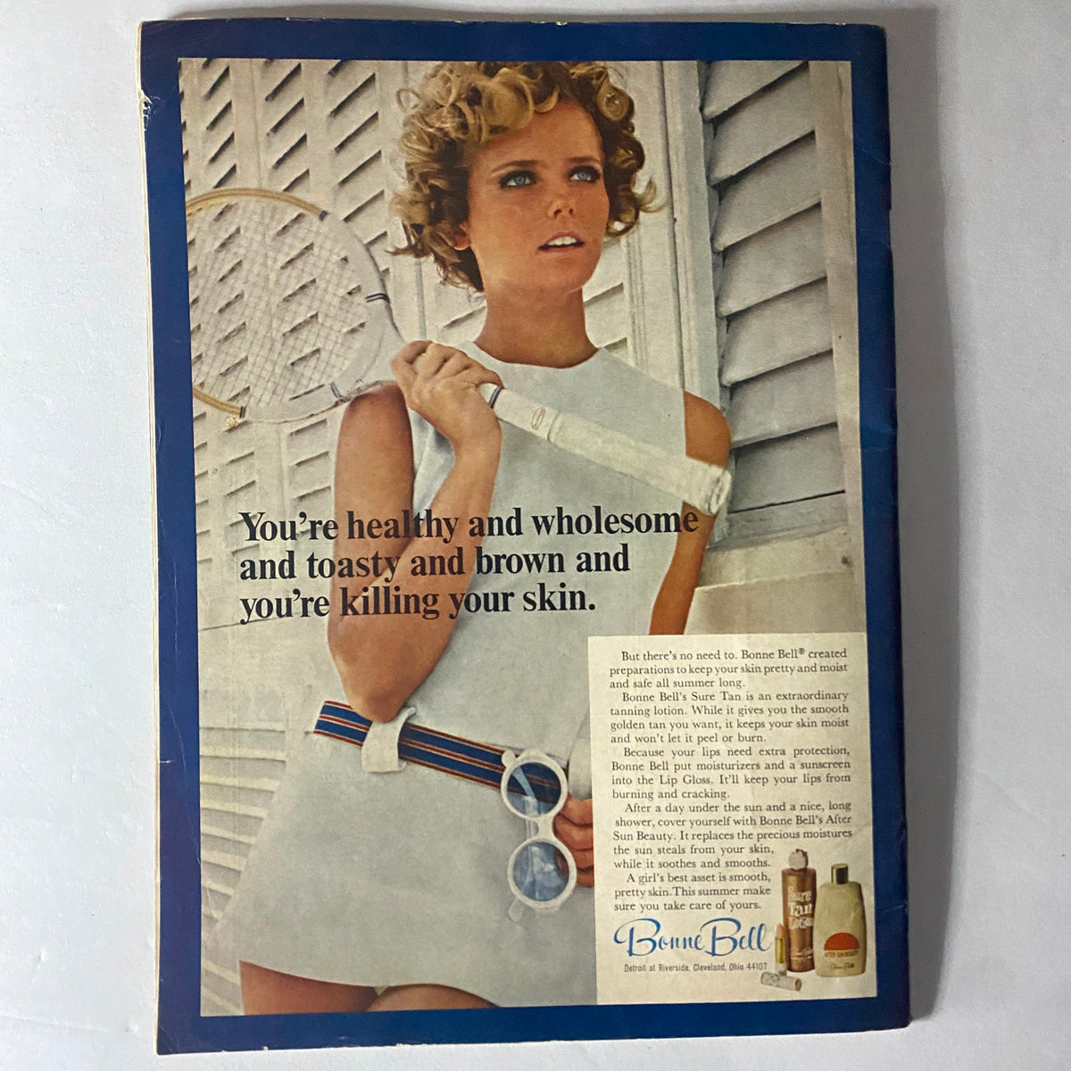 Back cover of American Girl Magazine, August 1967, featuring a vintage advertisement for Bonne Bell skincare products with a model holding a tennis racket.