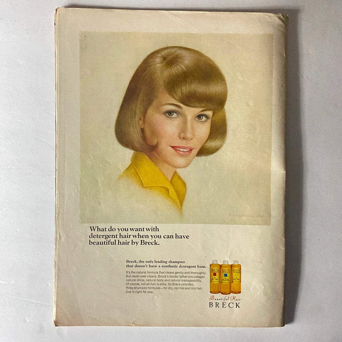 Advertisment page from American Girl Magazine, March 1965, showcasing Breck shampoo with an illustration of a smiling woman and a tagline about beautiful hair.