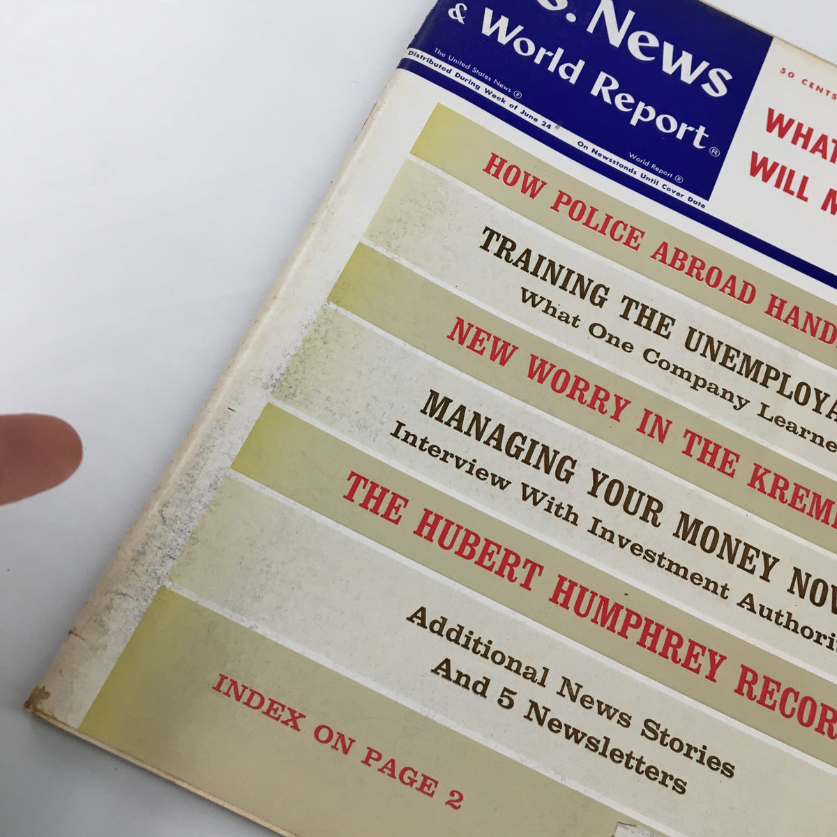 Close-up of the cover of US News & World Report Magazine July 1 1968, highlighting article titles including 'Training the Unemployables' and 'New Worry in the Kremlin' under the main headline 'What The Tax Rise Will Mean To You'.