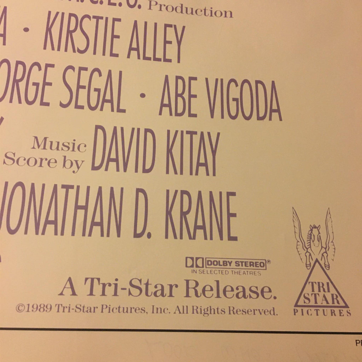 Close-up of the credits from the 1989 Look Who's Talking 41" x 27" Original Movie Poster, showcasing production details including cast and crew associated with the film.