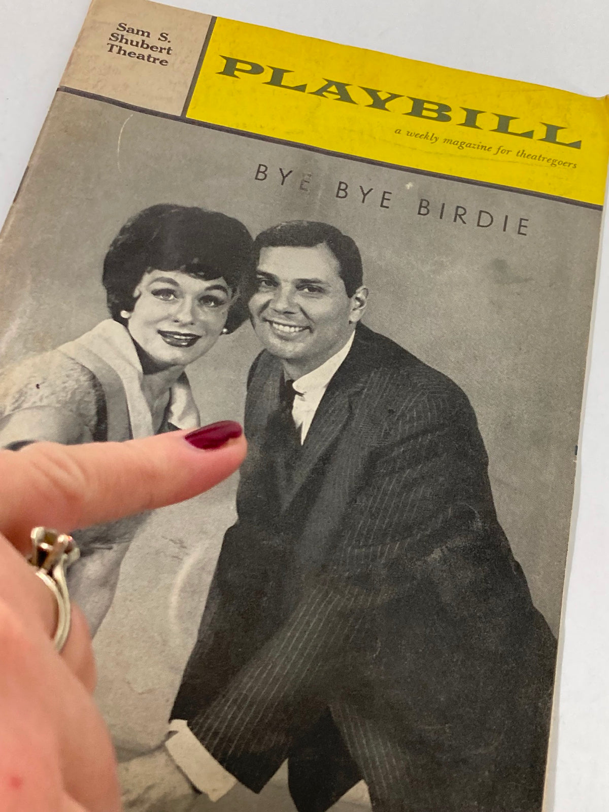 Close-up of the 1961 Playbill from Bye Bye Birdie, highlighting the actors Gretchen Wyler and her co-star. Collectible theater item from the Sam S. Shubert Theatre.