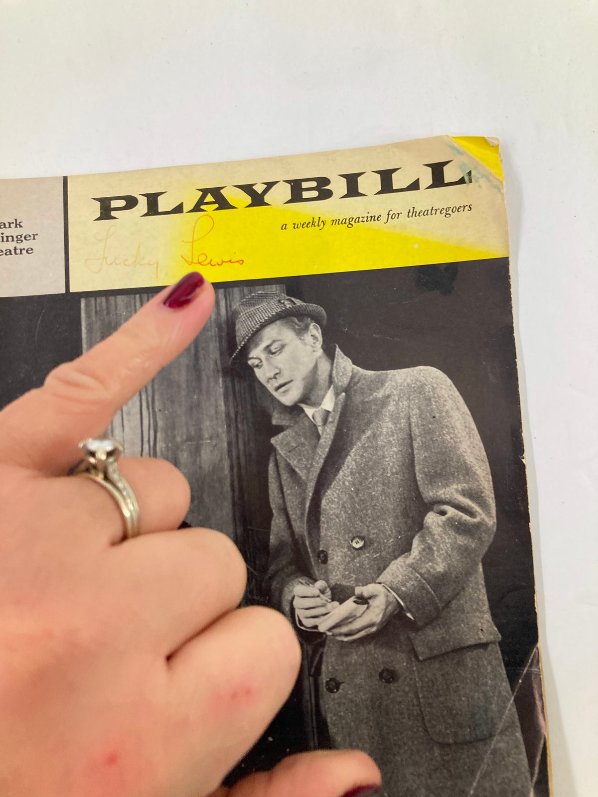 Close-up of the 1959 Playbill from Mark Hellinger Theatre for My Fair Lady, highlighting a signature and the wear on the cover.