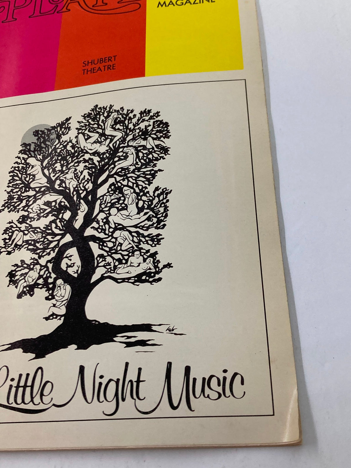 Close-up view of the 1973 Playbill for A Little Night Music at Sam S. Shubert Theatre, highlighting the intricate tree artwork and title.