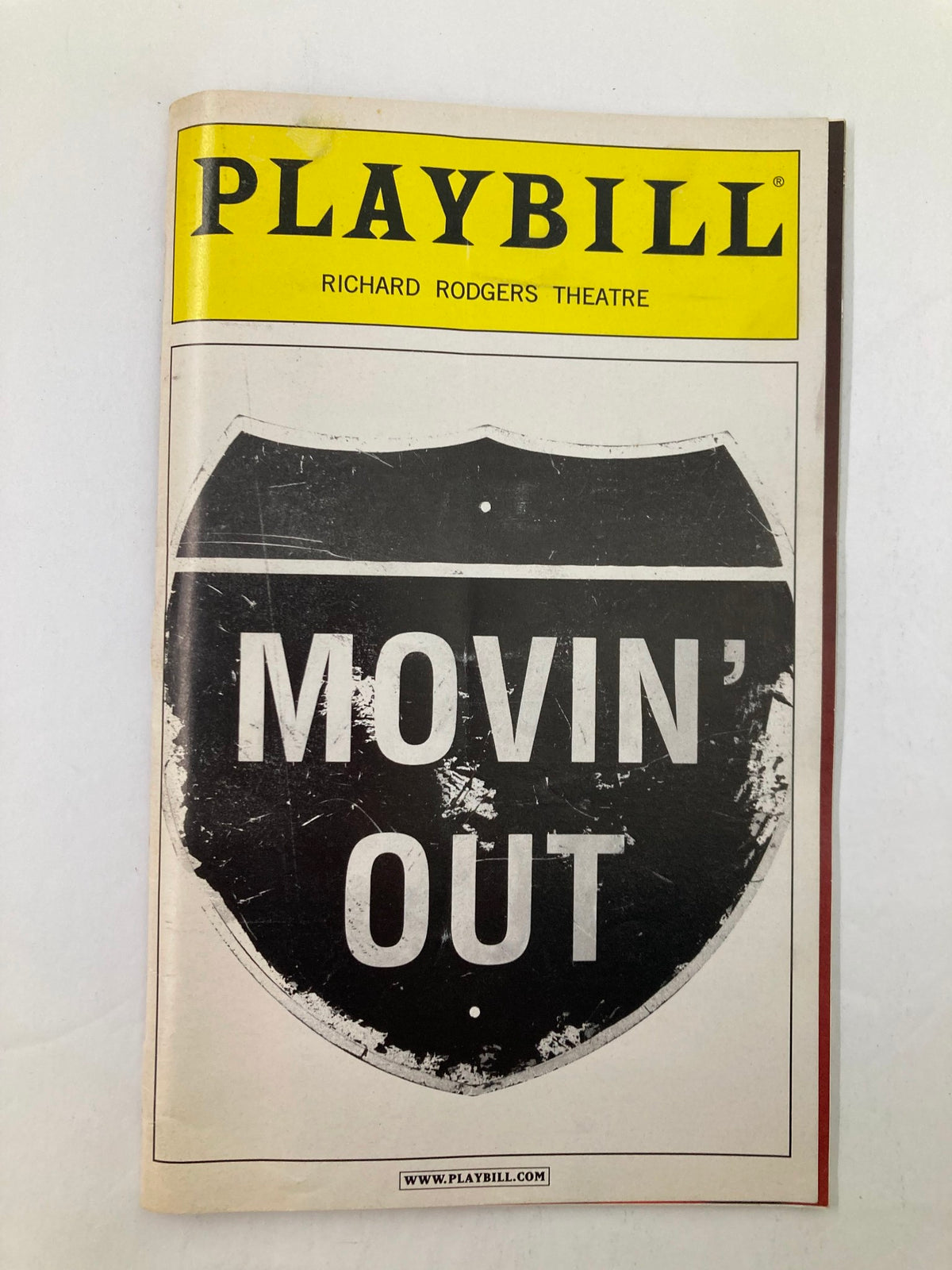 2003 Playbill for Movin' Out at Richard Rodgers Theatre featuring a bold title on a black and white cover.