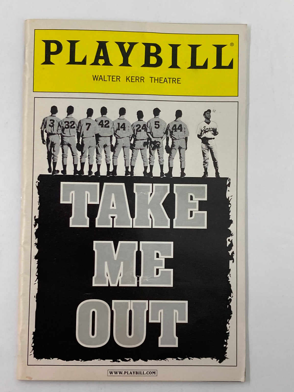 2003 Playbill for the play 'Take Me Out' at the Walter Kerr Theatre, featuring the iconic yellow cover and a bold title.