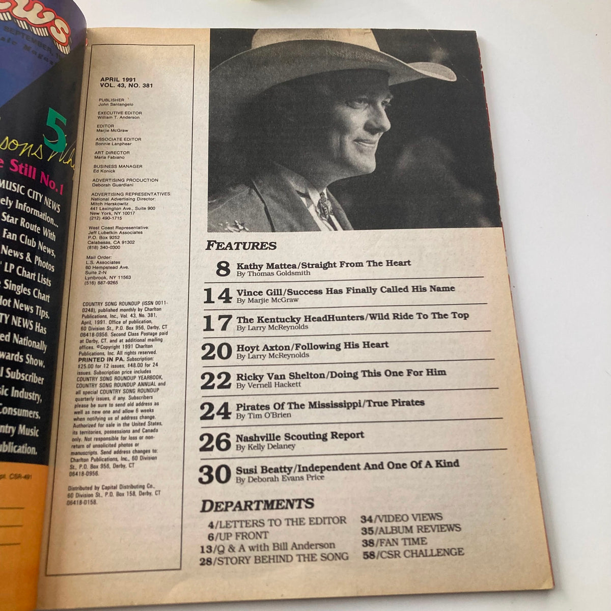 Inside page of Country Song Roundup Magazine, April 1991, displaying the list of features including articles on Kathy Mattea, Vince Gill, and the Kentucky Headhunters, alongside a classic cowboy image.