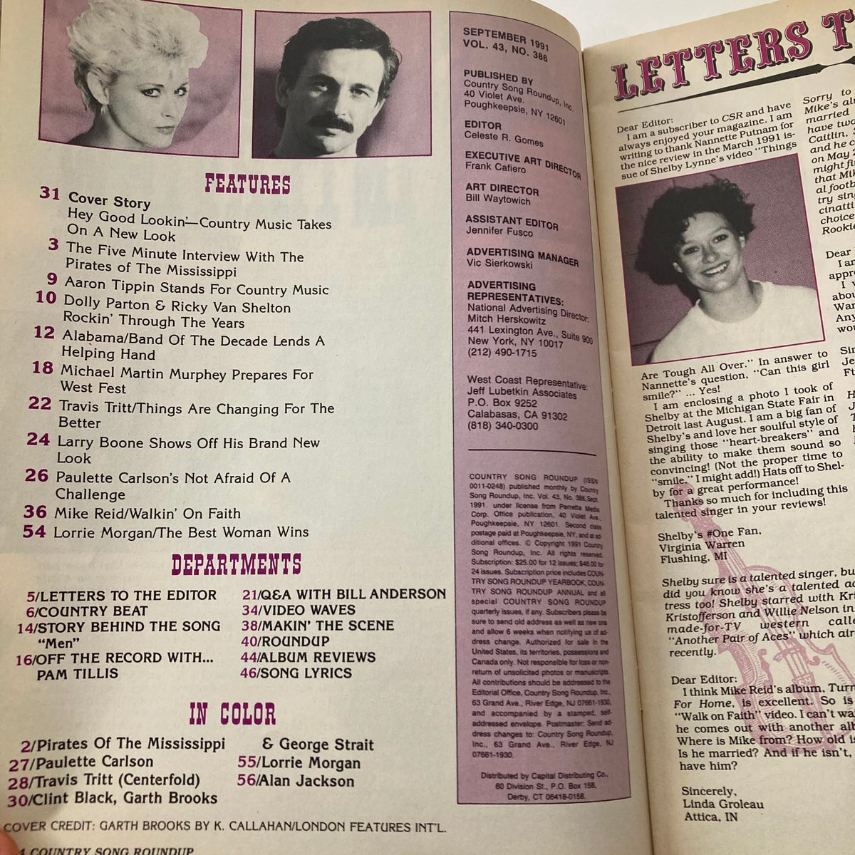 Inside pages of Country Song Roundup Magazine, September 1991, featuring country music stars Travis Tritt and Vince Gill, showcasing articles and features about the artists and the industry.