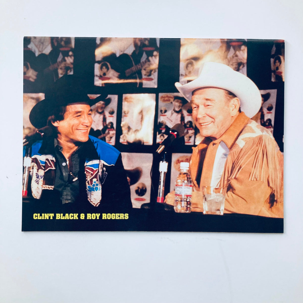 Clint Black and Roy Rogers at a country music event, featured in the Country Song Roundup Magazine, March 1992, highlighting iconic artists from the country music scene.