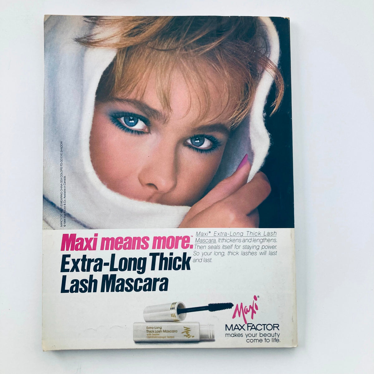 Back cover of VTG Seventeen Magazine April 1984 featuring an advertisement for Max Factor's Extra-Long Thick Lash Mascara, showcasing retro beauty products from the era.