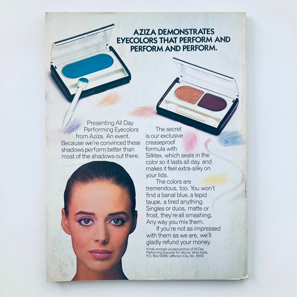 Back cover of VTG Seventeen Magazine March 1984 Cover Girls, advertising Aziza eye colors with an image of a model demonstrating makeup application.