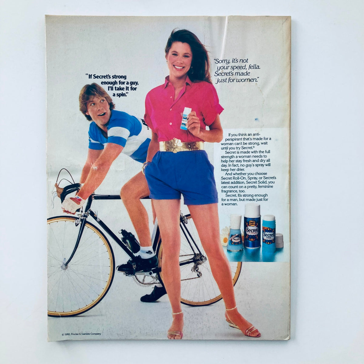 Back cover of VTG Seventeen Magazine June 1982 featuring an advertisement for Secret deodorant with a model and a cyclist.