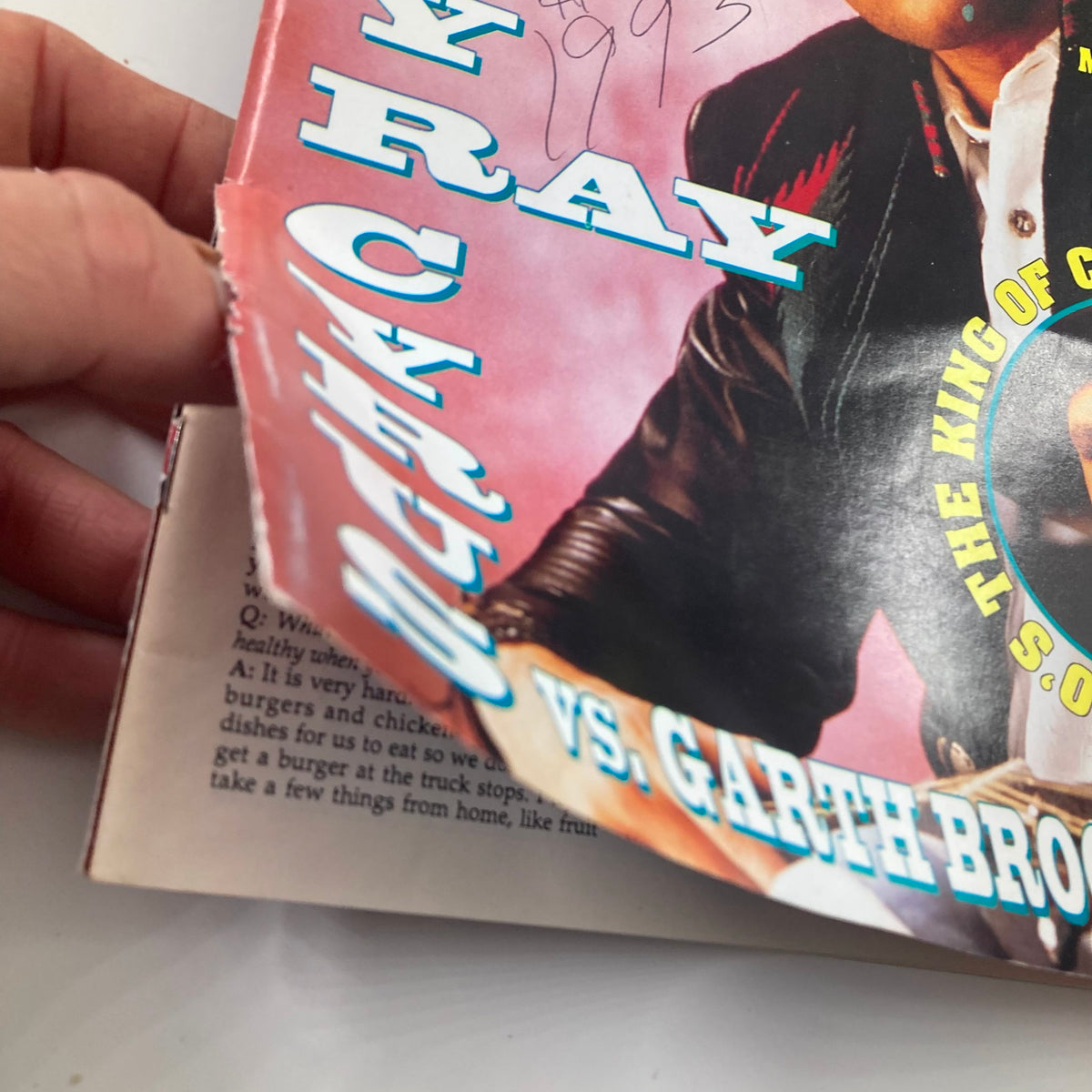 Close-up of VTG Country Song Roundup Magazine January 1993 cover, focusing on Billy Ray Cyrus vs. Garth Brooks headline.