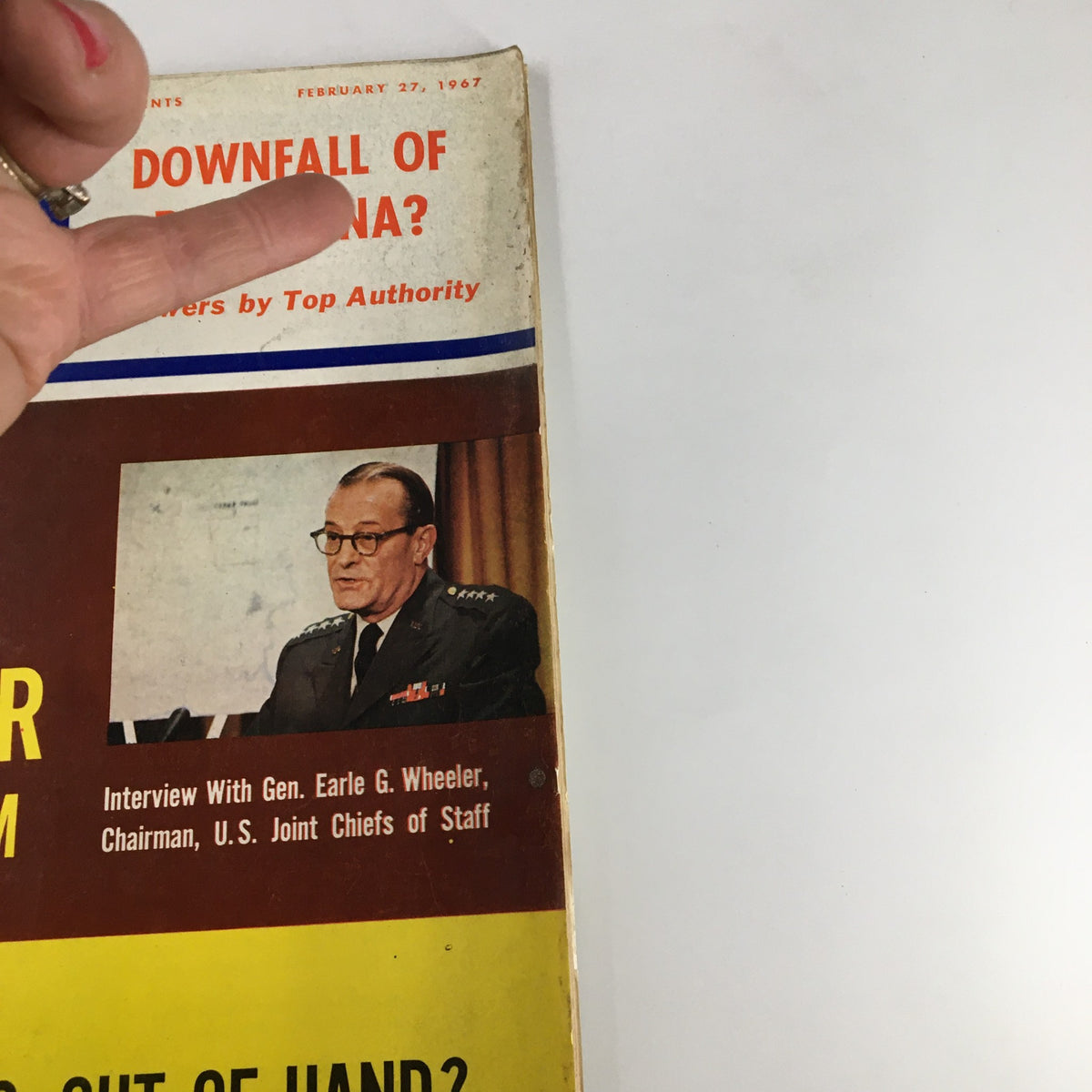 Close-up of the US News & World Report Magazine cover from February 27, 1967, highlighting the interview with Gen. Earle G. Wheeler and discussions on the downfall of Red China.