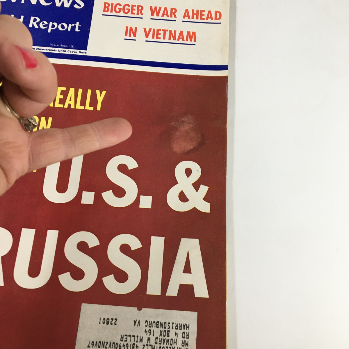 Close-up view of the US News & World Report Magazine Cover from March 27, 1967 titled 'Bigger War Ahead in Vietnam', highlighting minor wear and a label on the front.