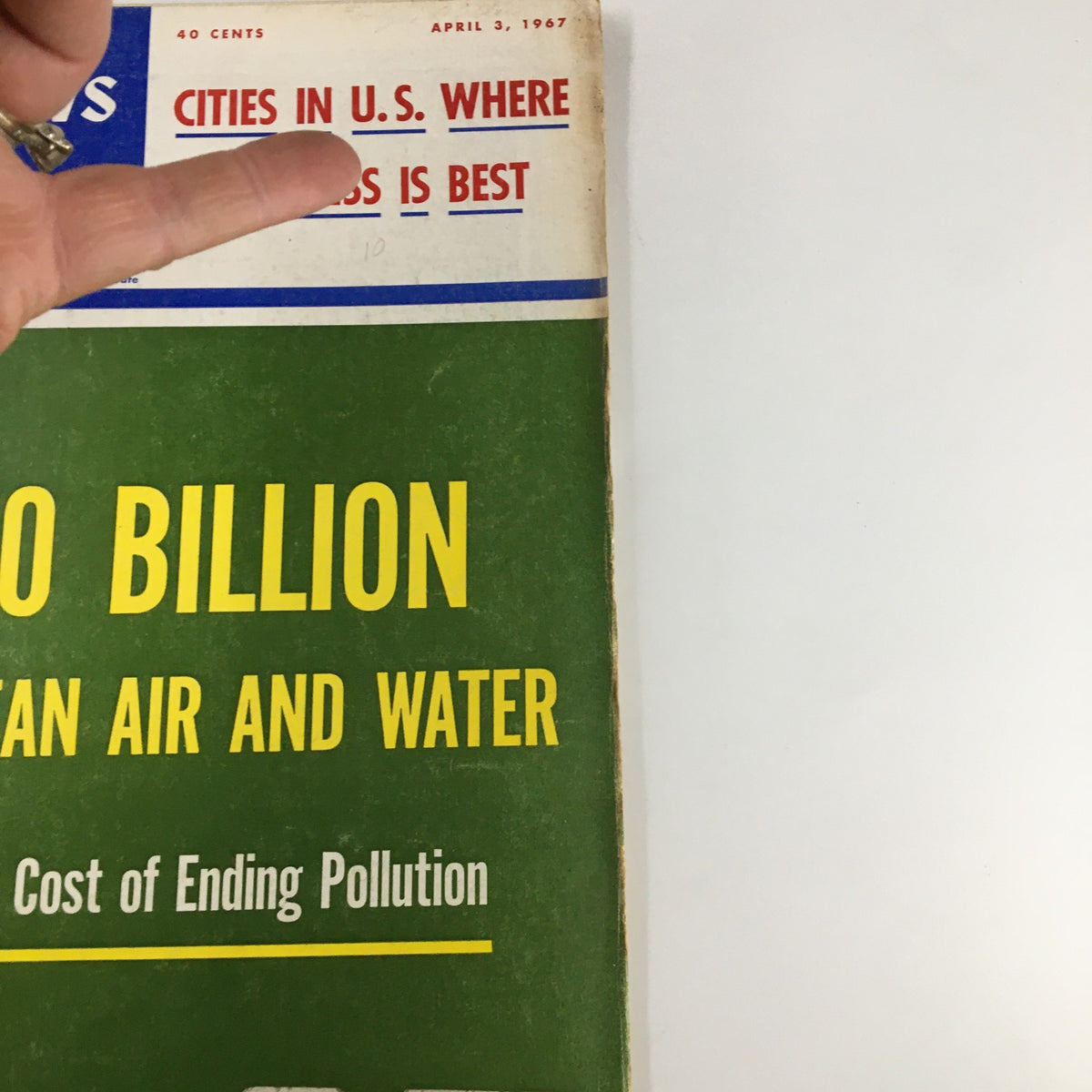 Close-up view of the cover of US News & World Report Magazine from April 3, 1967, showcasing the headline about '$300 Billion for Clean Air and Water'.