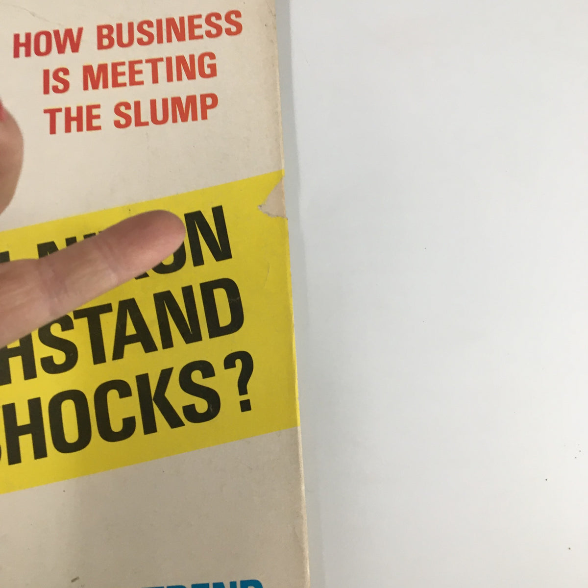 Close-up of the US News & World Report Magazine March 18 1974 cover, focusing on the question 'Can Nixon Withstand New Shocks?' and additional headline 'How Business is Meeting the Slump', showcasing the vintage design and era.