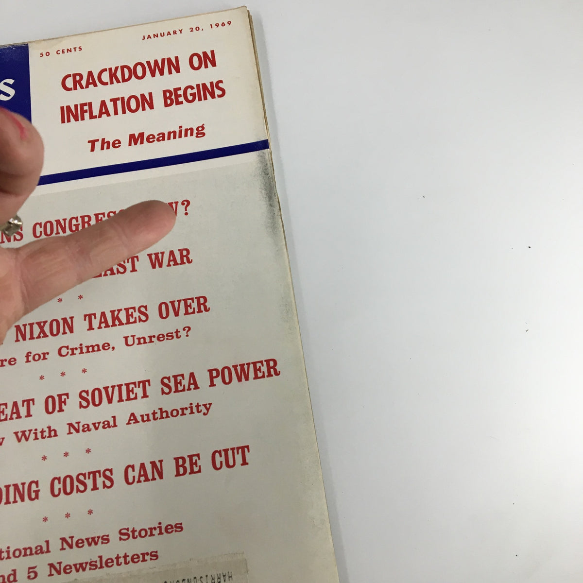 Close-up of US News & World Report Magazine January 20, 1969 with the headline 'Crackdown On Inflation Begins' highlighting key articles and news topics.
