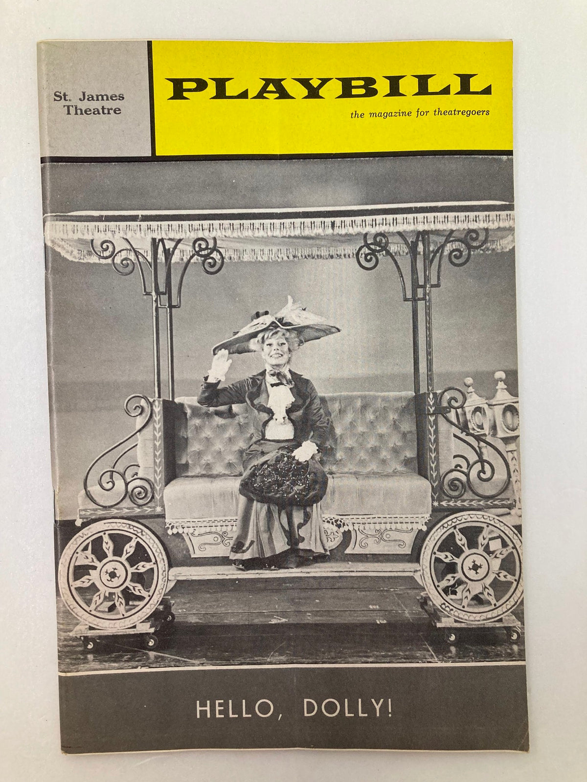1965 Playbill from St. James Theatre featuring Carol Channing in Hello, Dolly! showcasing vintage theatrical design.