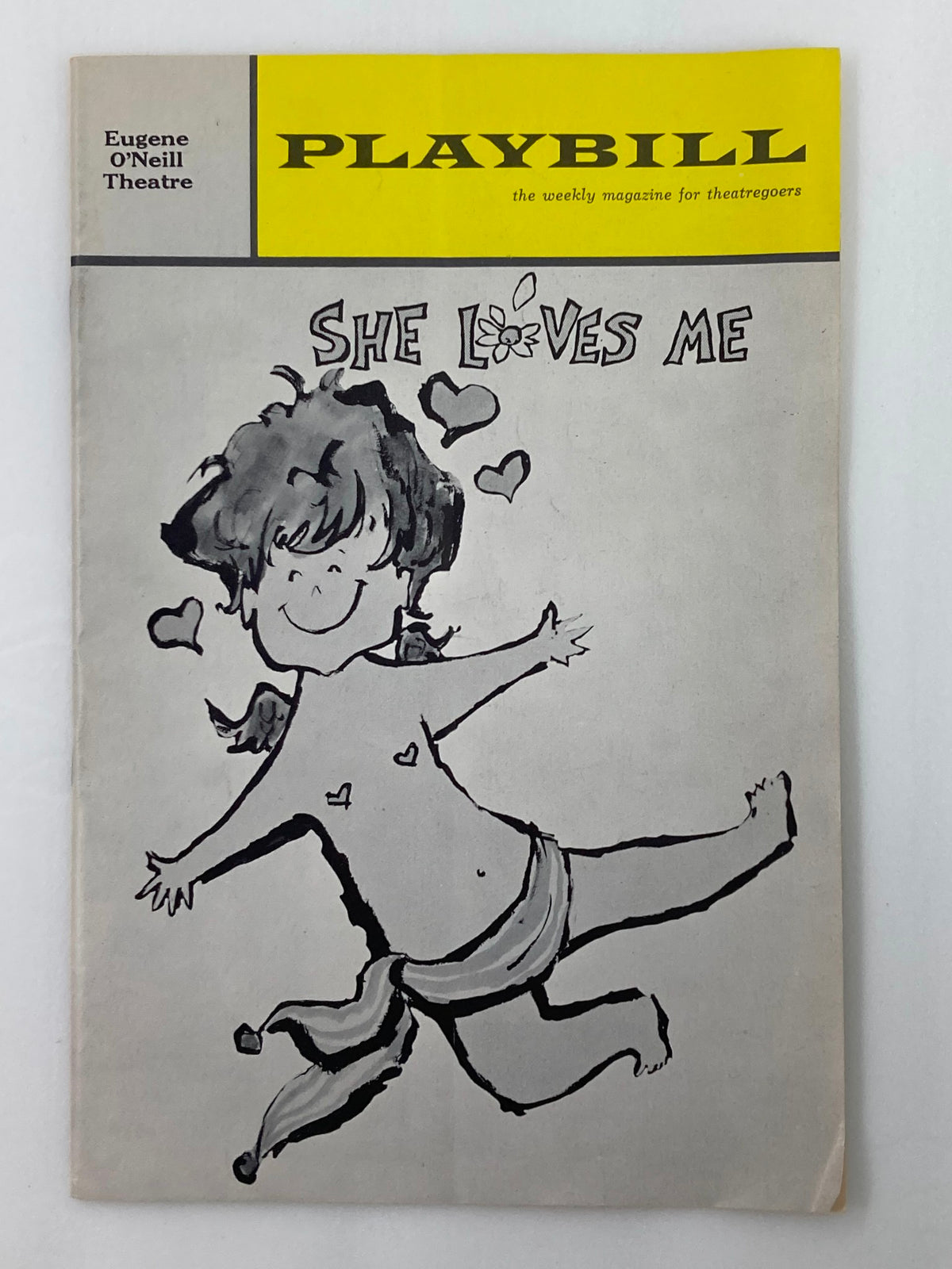 1963 Playbill featuring Barbara Cook in 'She Loves Me', showcasing a playful black and white illustration on the cover with hearts.