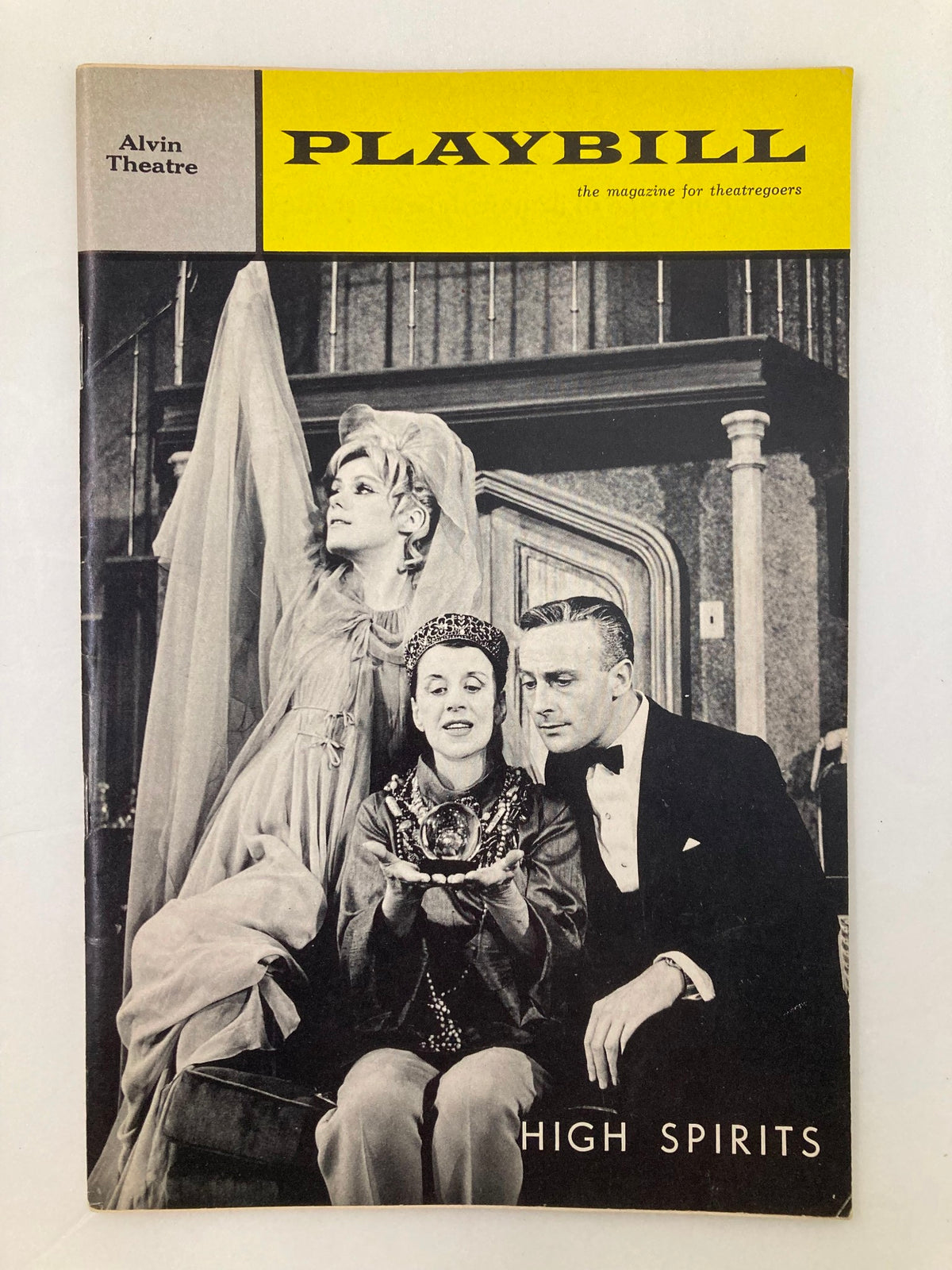 1964 Playbill from the Alvin Theatre featuring Beatrice Lillie and Tammy Grimes in High Spirits, showcasing vintage theatre design and performances.