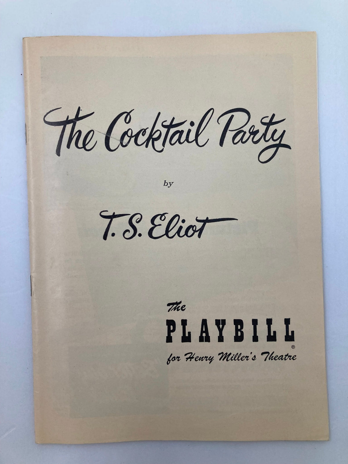 Cover of the 1950 Playbill for 'The Cocktail Party' by T.S. Eliot, presented at Henry Miller's Theatre featuring elegant typography and classic design.