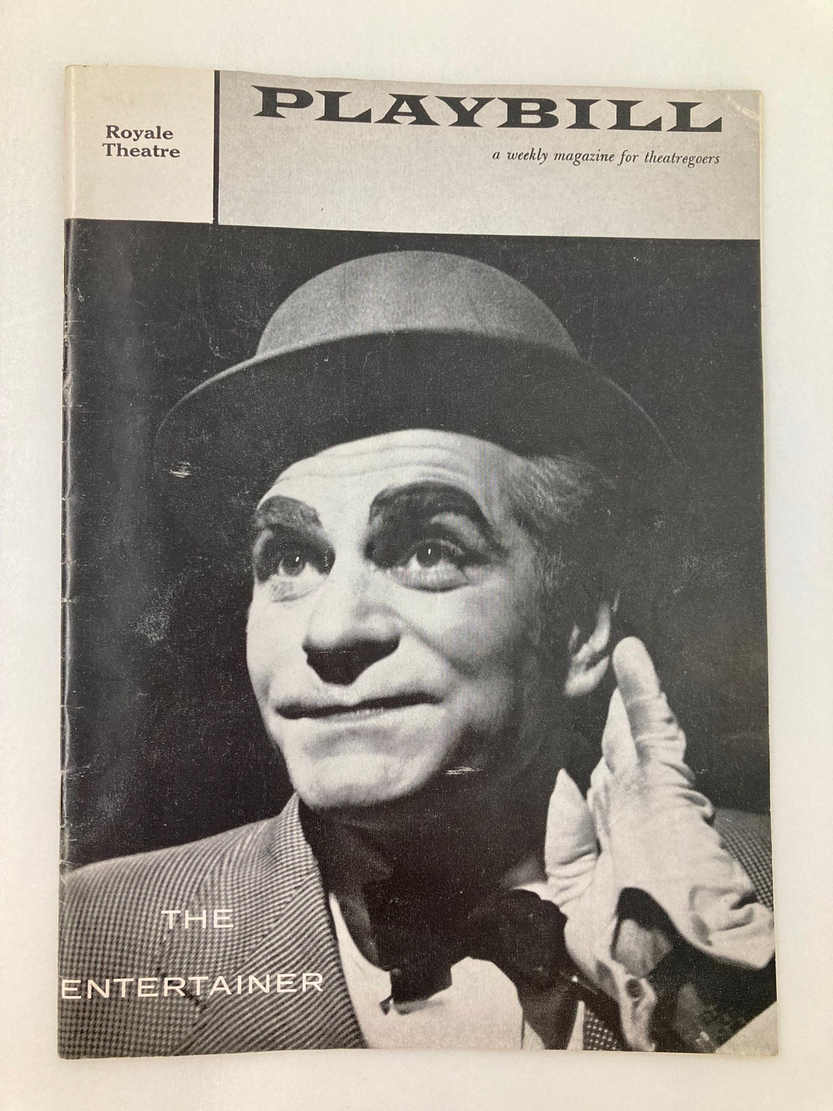 Cover of 1958 Playbill for The Entertainer at Royale Theatre featuring a portrait of Laurence Olivier.