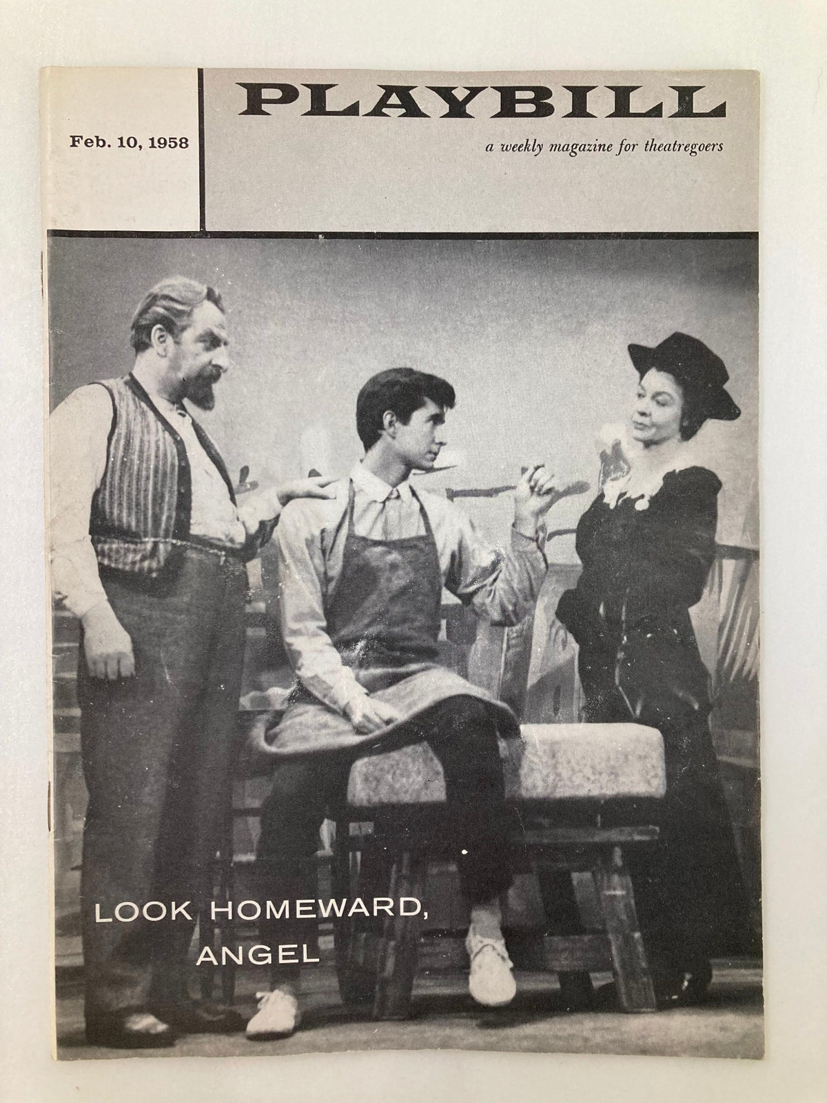 1958 Playbill of Look Homeward, Angel featuring a black and white image of the cast on stage at the Ethel Barrymore Theatre.