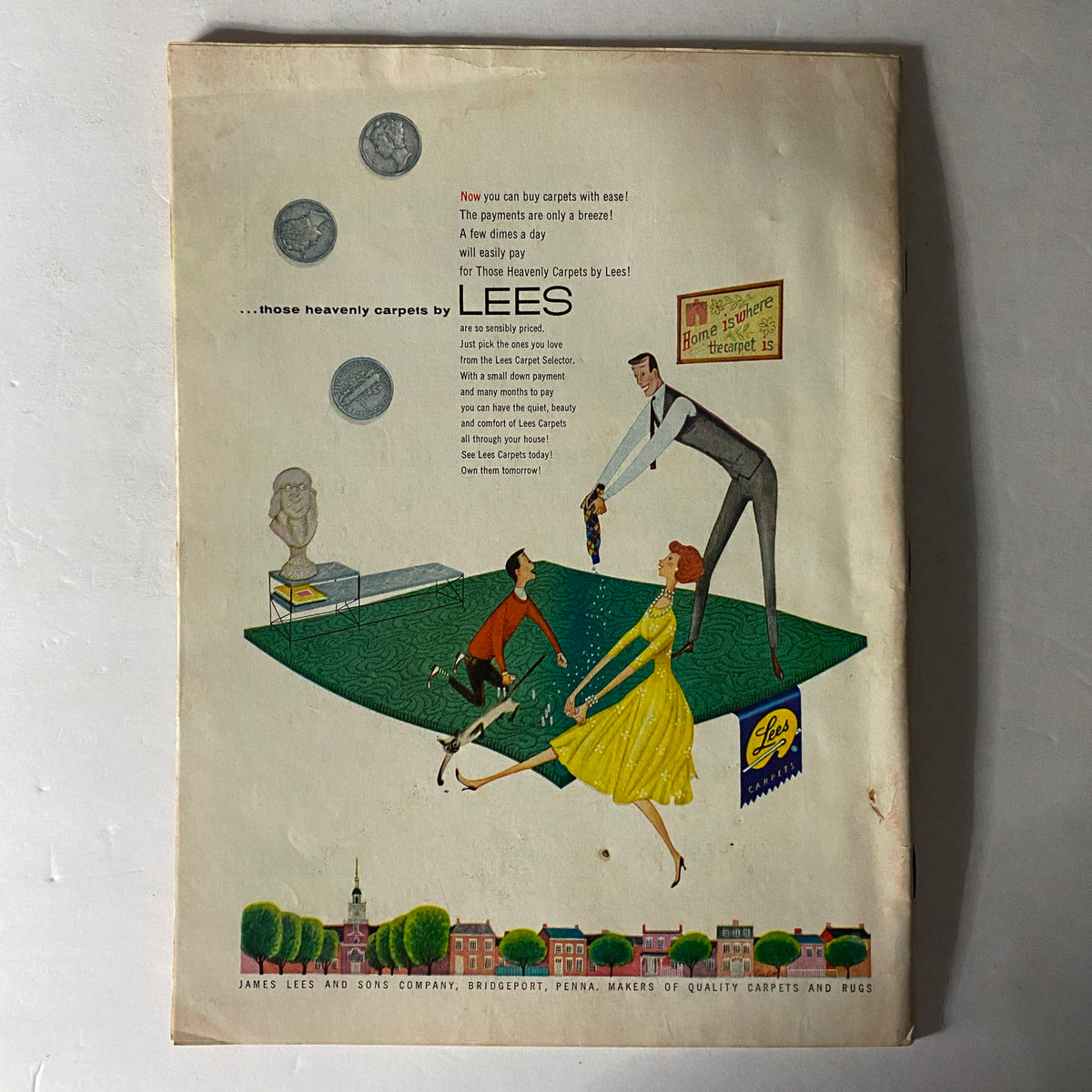 Vintage advertisement for Lees carpets featuring a cheerful family playing on a green carpet. The ad emphasizes easy payment plans for home carpeting, reflecting mid-20th century design aesthetics.