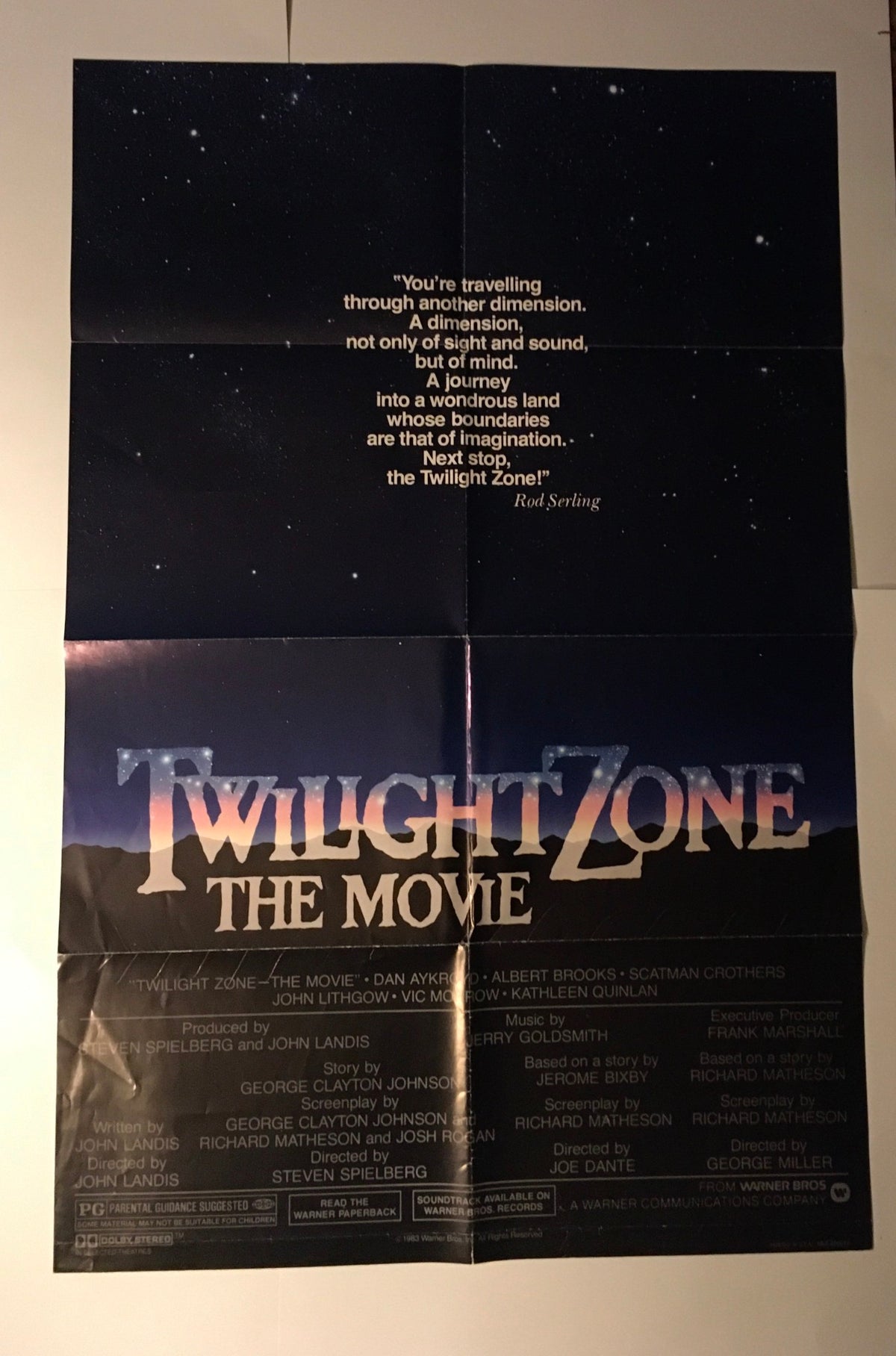 '1983 Twilight Zone: The Movie' original movie poster displaying a galaxy backdrop and Rod Serling's iconic quote about imagination.