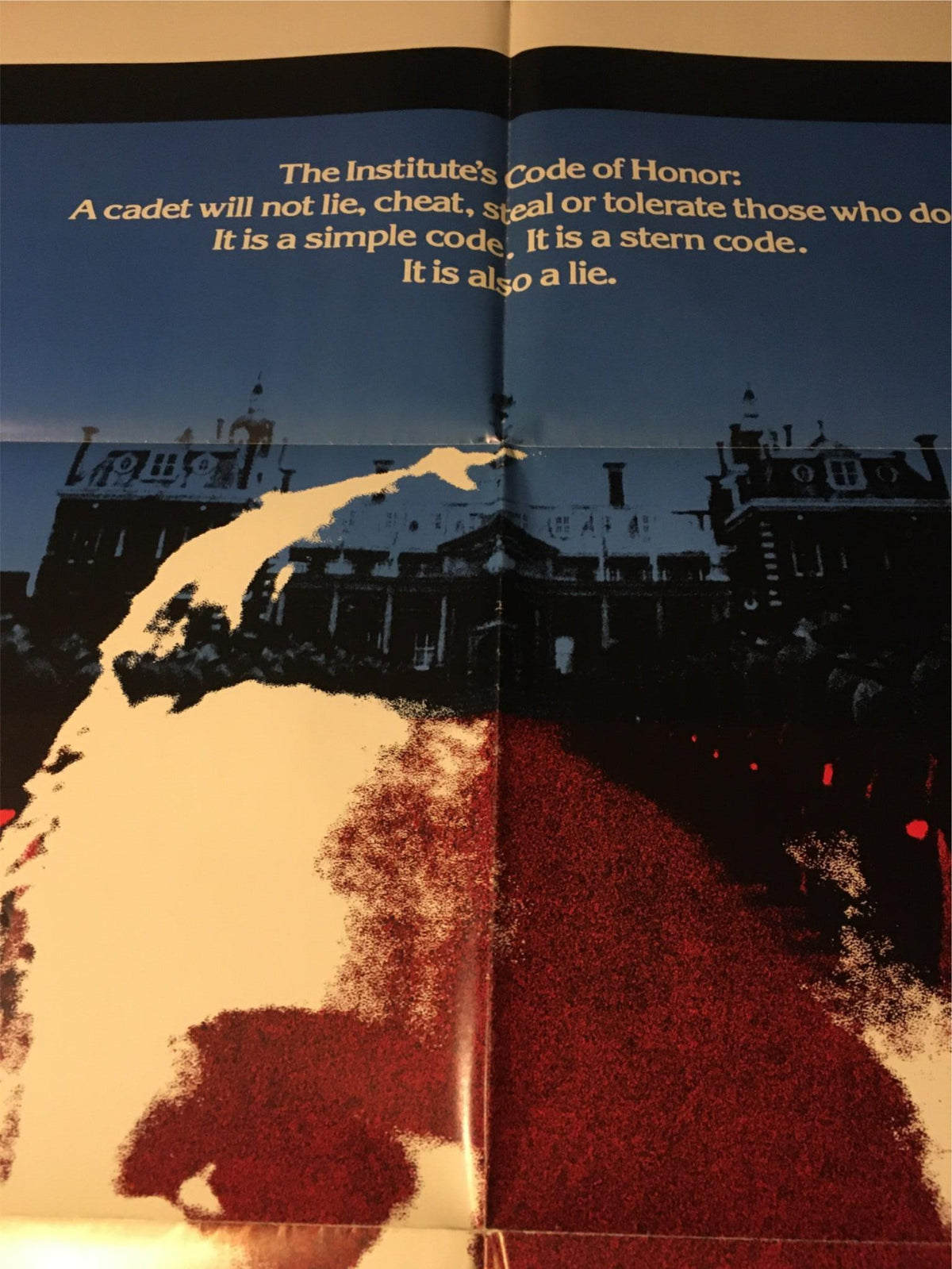 Textual detail from the 1983 The Lords of Discipline Original Movie Poster, featuring the institute's code of honor and its evocative visual backdrop. Perfect for nostalgic display.