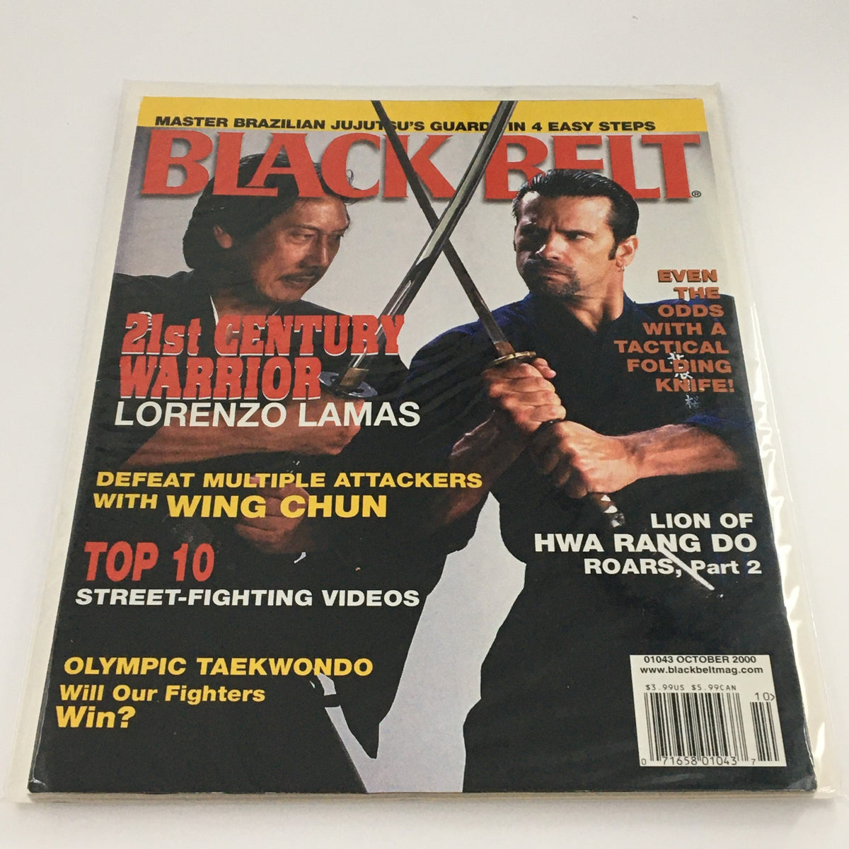 Cover of Black Belt Magazine, October 2000, featuring Lorenzo Lamas as a 21st Century Warrior, showcasing a martial arts theme with swords.