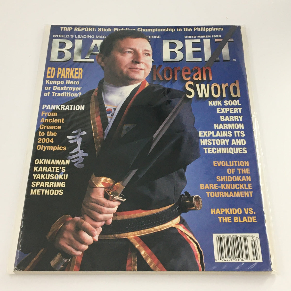 Black Belt Magazine March 1999 featuring Ed Parker on the cover, titled 'Kenpo Hero or Destroyer of Tradition', showcasing martial arts topics including Kuk Sool and Okinawan techniques.