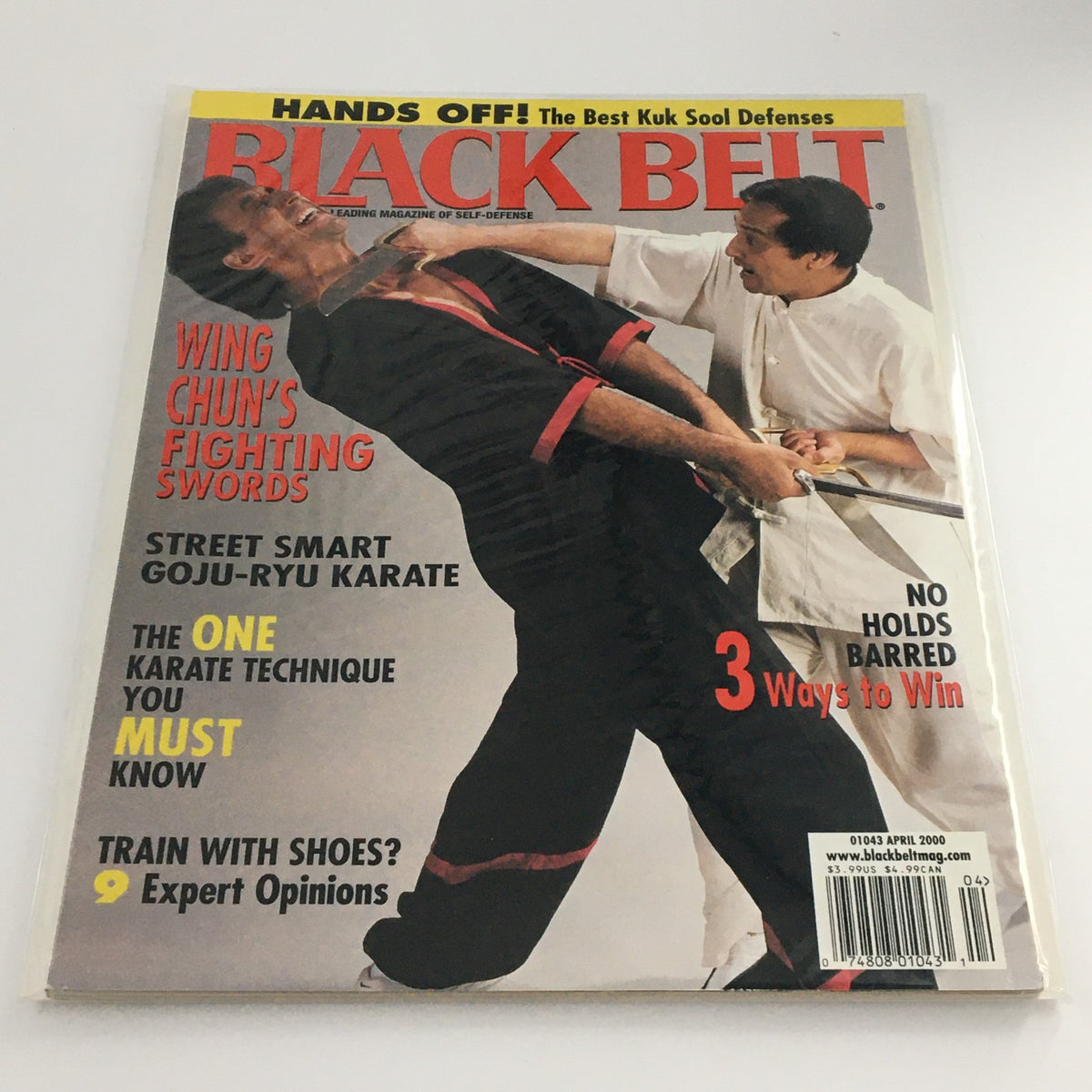 Black Belt Magazine April 2000 featuring Wing Chun's Fighting Swords on the cover with martial arts action illustration.