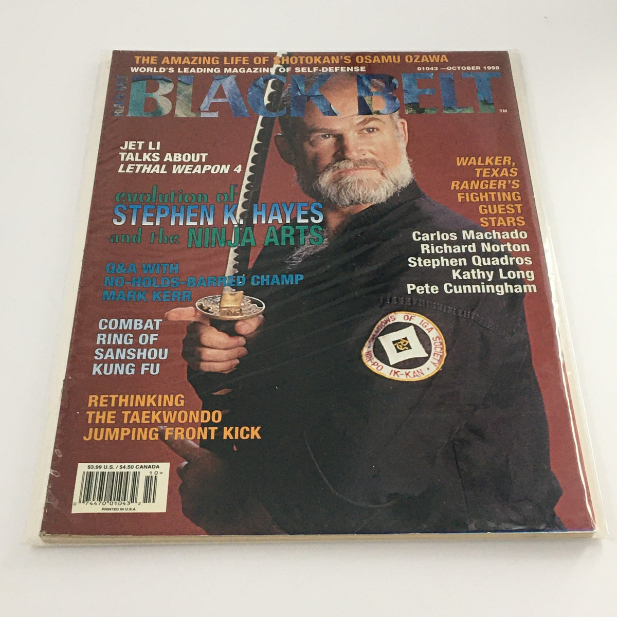 Cover of Black Belt Magazine October 1998 featuring 'The Evolution of Stephen K. Hayes' with a martial artist holding a sword, highlighting the article topics and contributing guest stars.