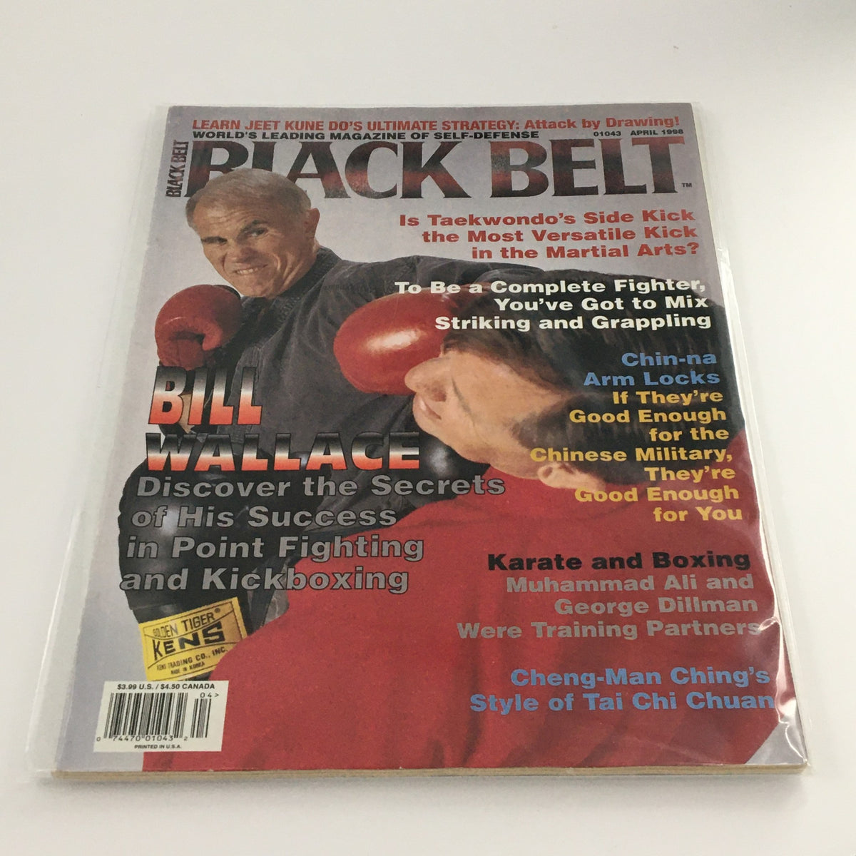 Cover of Black Belt Magazine April 1998 featuring Bill Wallace, highlighting point fighting and kickboxing techniques, ideal for martial arts enthusiasts.