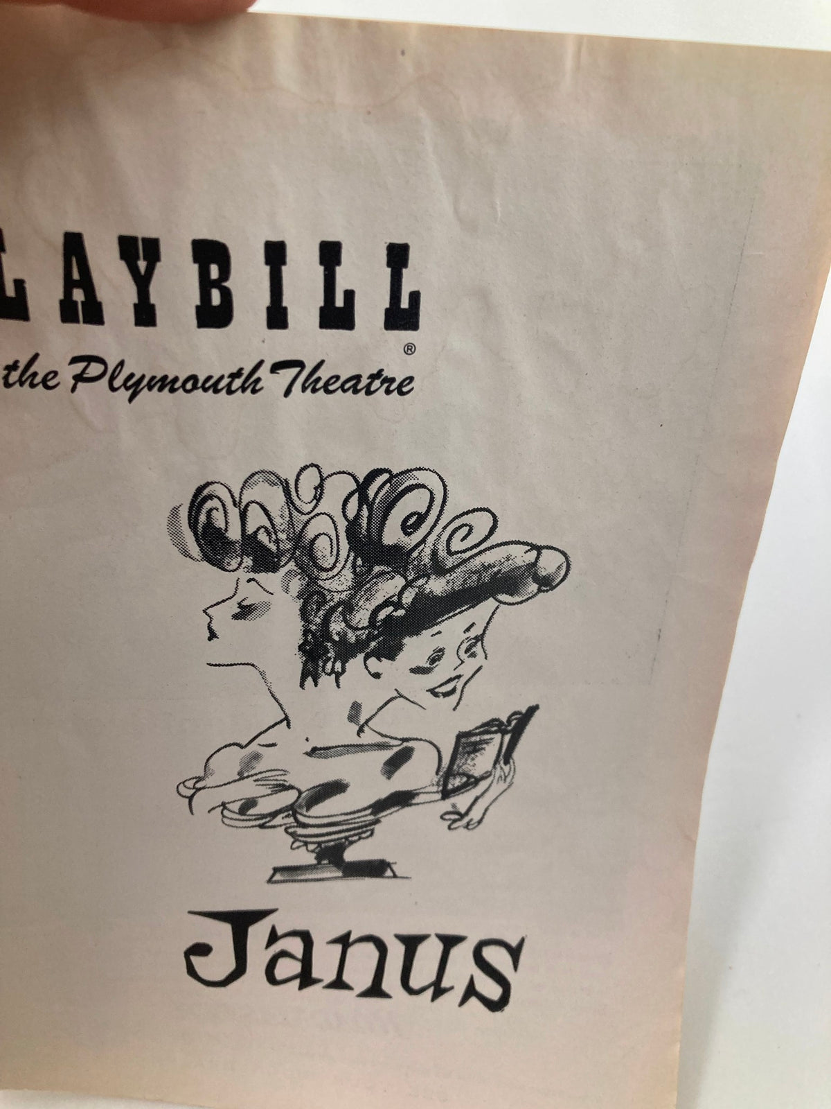 Close-up of the 1956 Playbill for The Plymouth Theatre, emphasizing the stylish illustration and title Janus.
