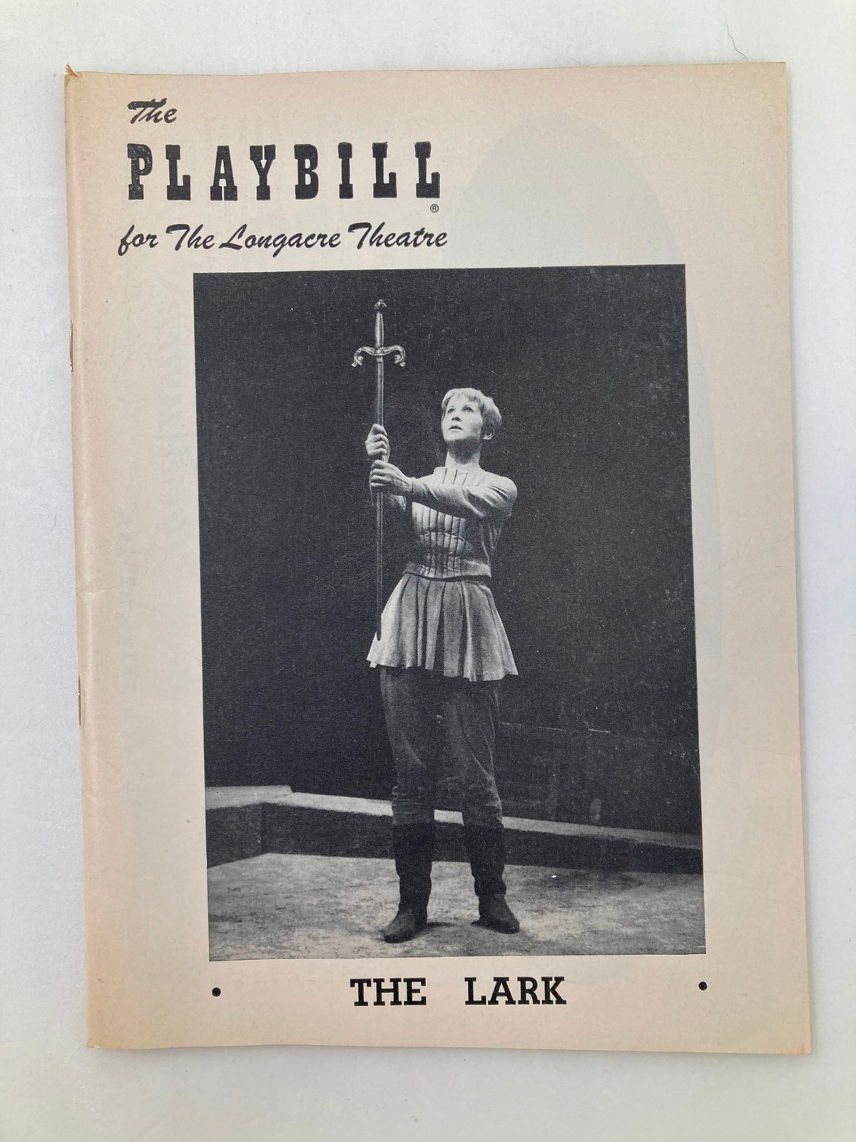 1956 Playbill for The Lark at the Longacre Theatre featuring a striking black and white image of a female performer holding a sword, representing the iconic performances of Julie Harris and Boris Karloff.