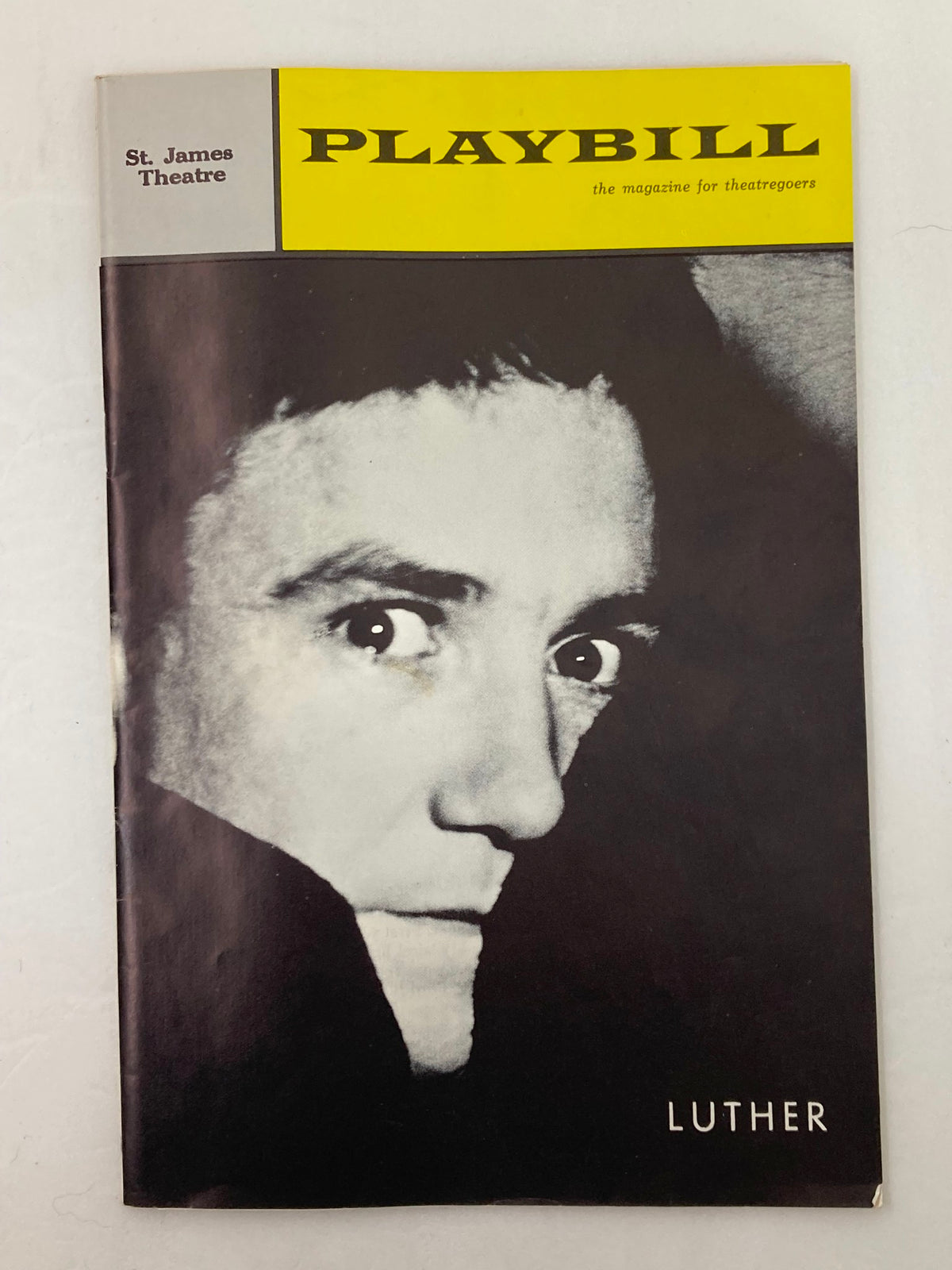 1963 Playbill from St. James Theatre featuring a black and white image of actor Albert Finney in the production of Luther.