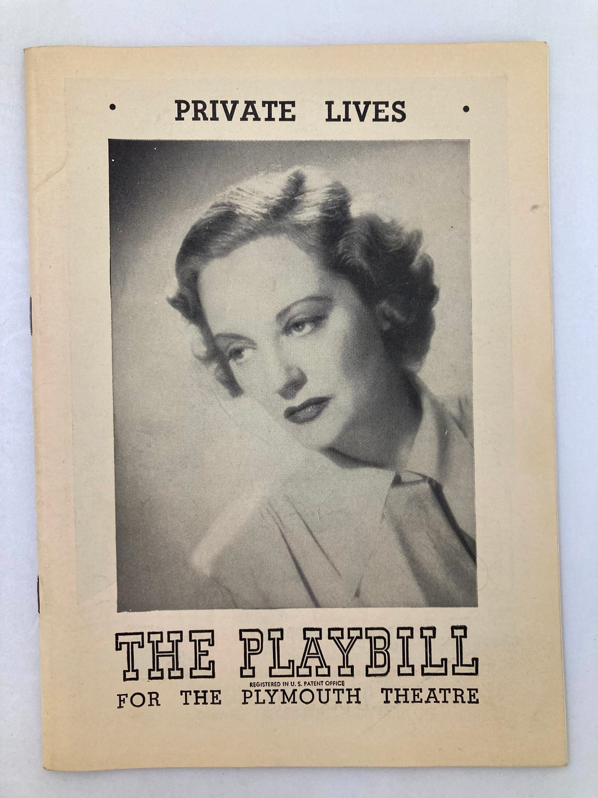 Cover of the 1949 Playbill for The Plymouth Theatre featuring the title 'Private Lives' and a portrait image of actress Barbara Baxley. A collectible item showcasing mid-20th century theater history.