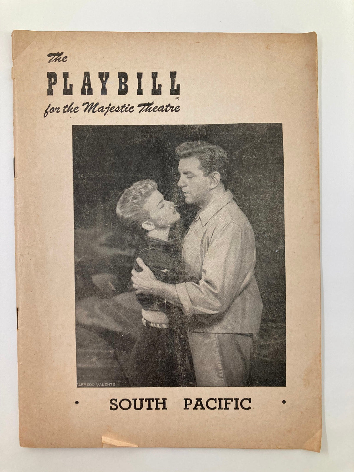 1953 Playbill for the Majestic Theatre featuring South Pacific with a vintage graphic cover and images of the characters.