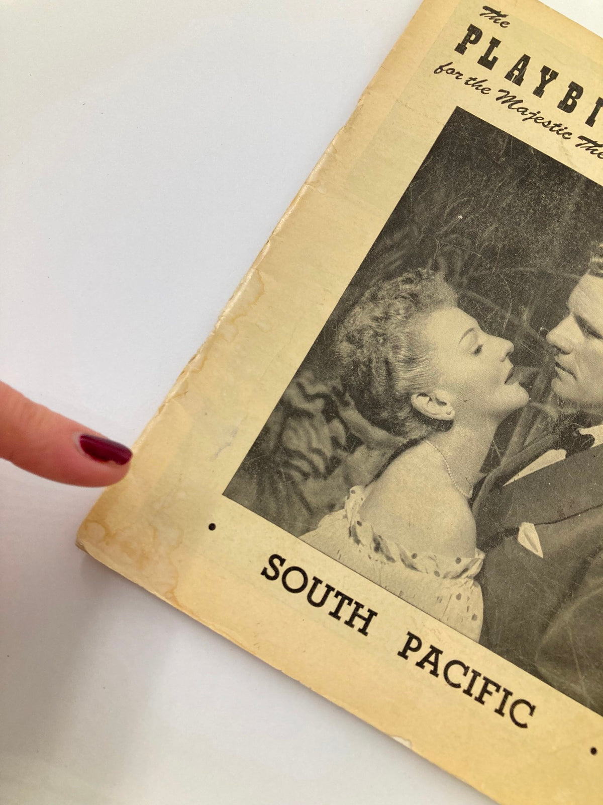 Close-up of the 1950 Playbill for South Pacific at the Majestic Theatre, highlighting the vintage cover design and details of the iconic Broadway production.