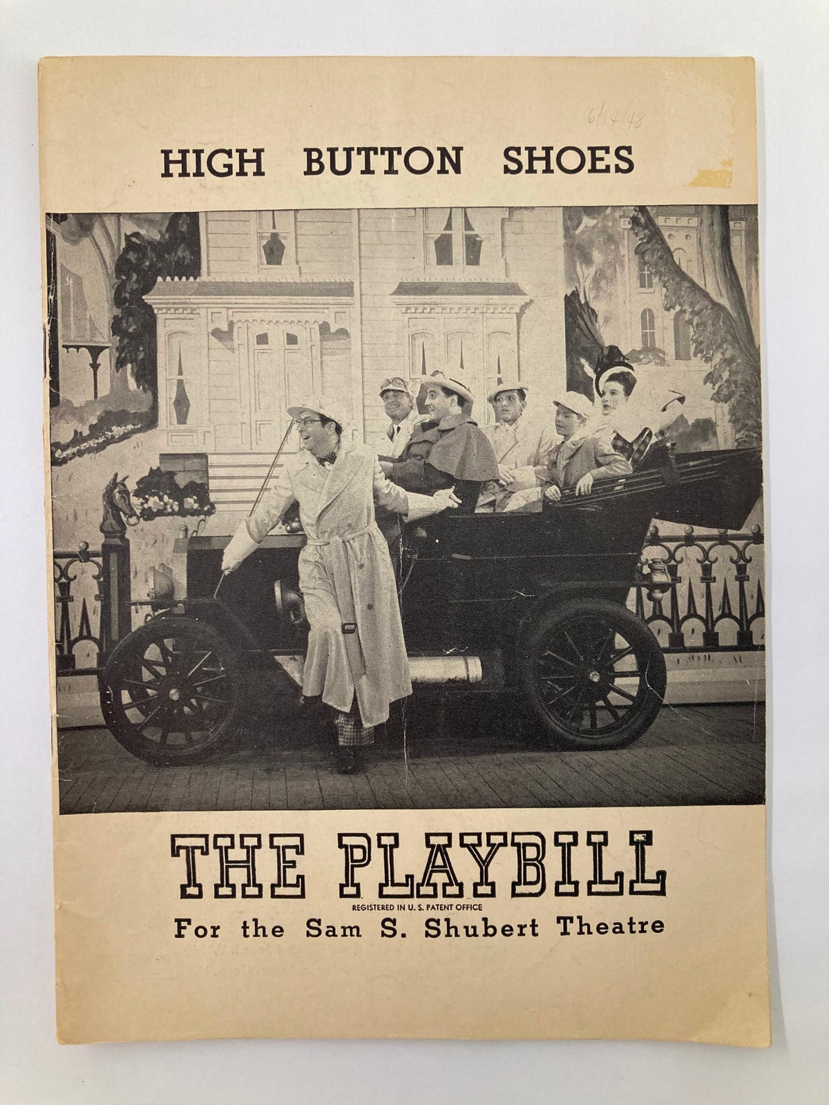 1948 Playbill for Sam S. Shubert Theatre featuring Phil Silvers in High Button Shoes, showcasing a theatrical scene with actors in costume standing around a vintage car.