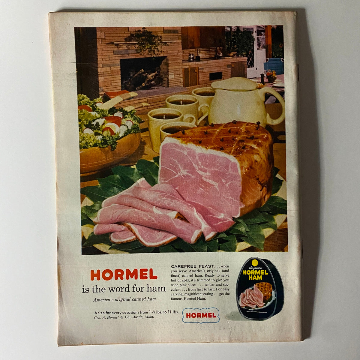 Vintage advertisement for Hormel ham from Time Magazine June 22 1959 Vol 73 No. 25 featuring a beautiful kitchen setting with a ham centerpiece, highlighting America's original canned ham.