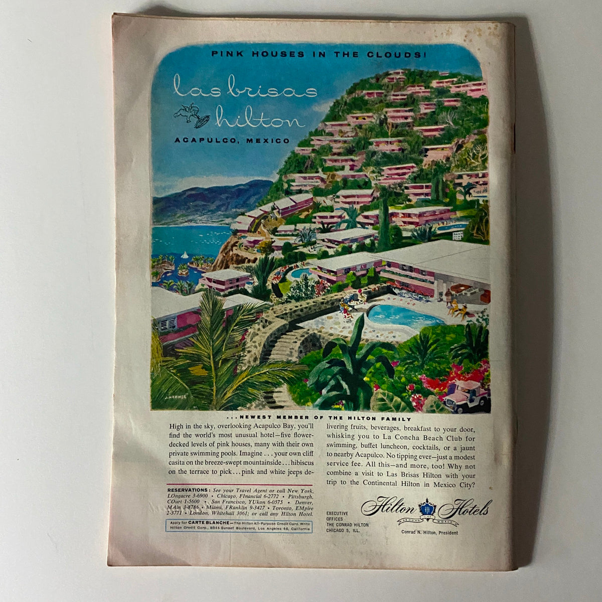 The back cover of Time Magazine September 7, 1959, featuring an advertisement for Las Brisas Hilton in Acapulco, Mexico, showcasing pink houses on a hillside overlooking the bay.