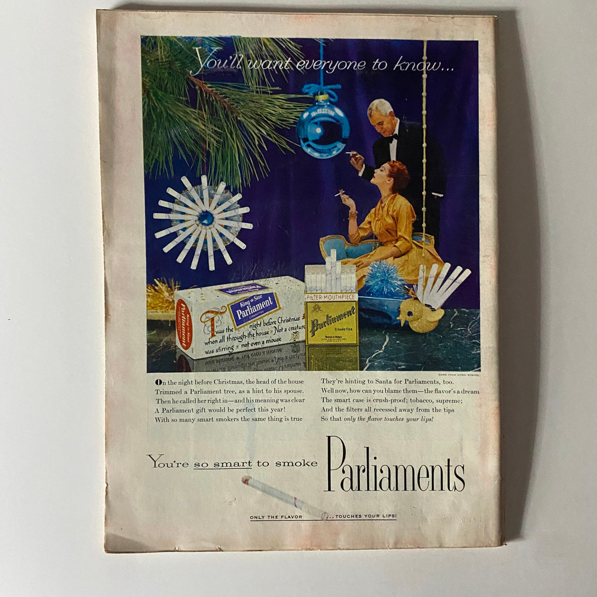 Vintage advertisement from Time Magazine December 19, 1955, featuring a Christmas-themed promotion for Parliament cigarettes, highlighting mid-20th century marketing aesthetics.