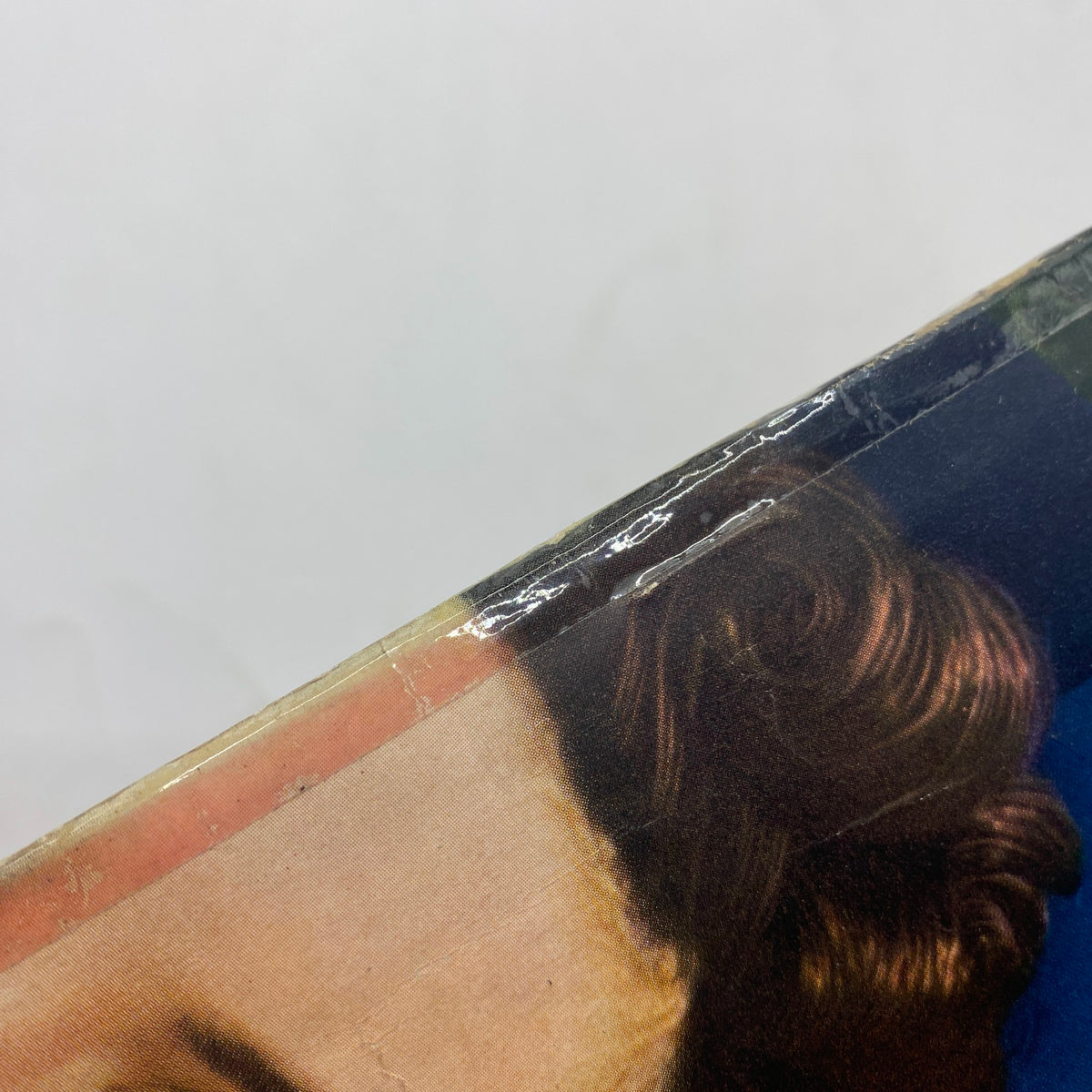 Close-up of the cover detail of Mademoiselle Magazine July 1940, Imperfect Venus Number, showcasing edges with light wear and vintage aesthetics.