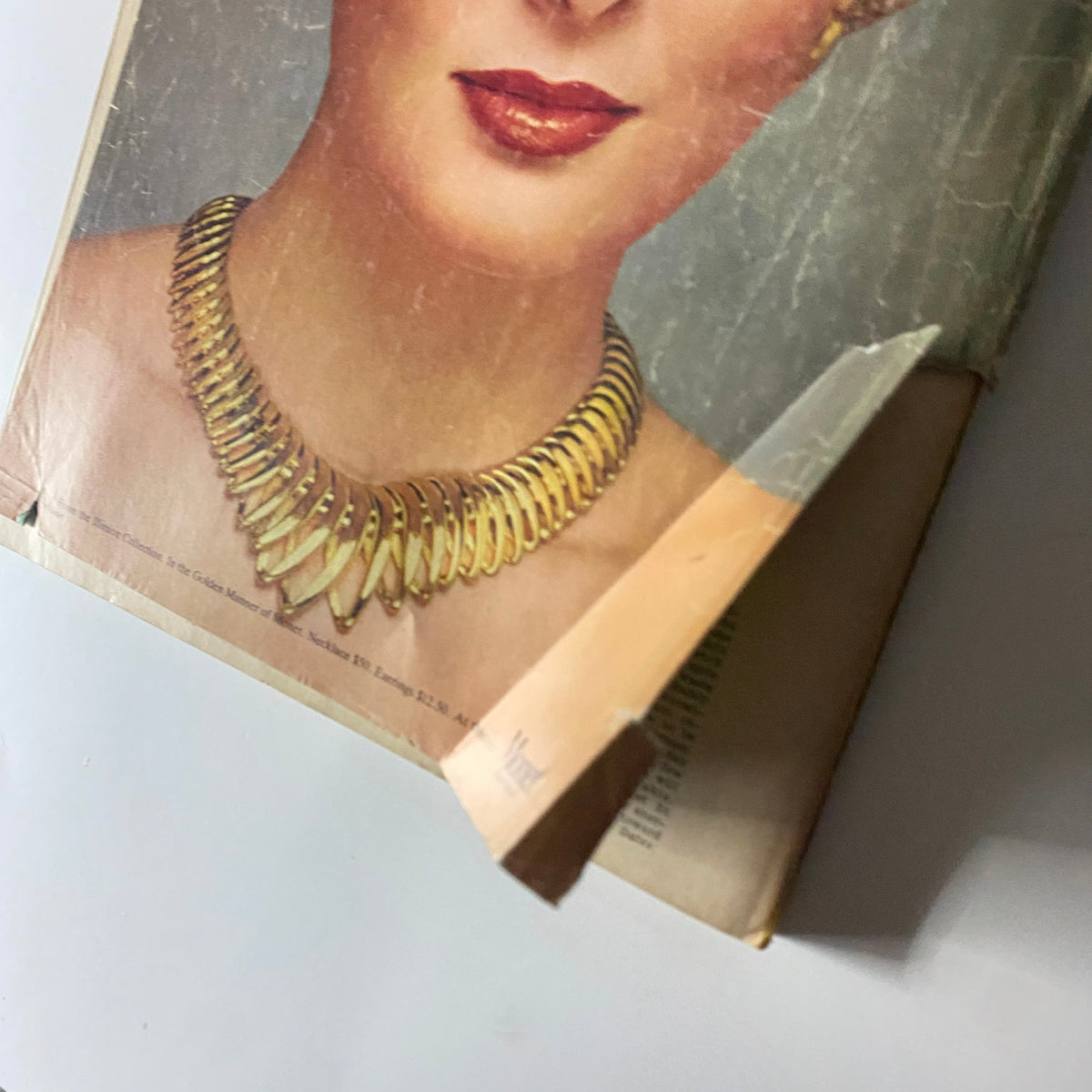 Close-up of the Harper's Bazaar Magazine September 1979 cover, showcasing a vintage fashion model in a gold necklace and head wrap, emblematic of the era's aesthetic.
