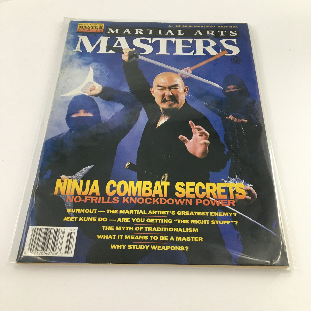 Martial Arts Masters Magazine July 1992 featuring Ninja Combat Secrets on the cover, showcasing a martial artist in action with weapons and ninjas in the background.