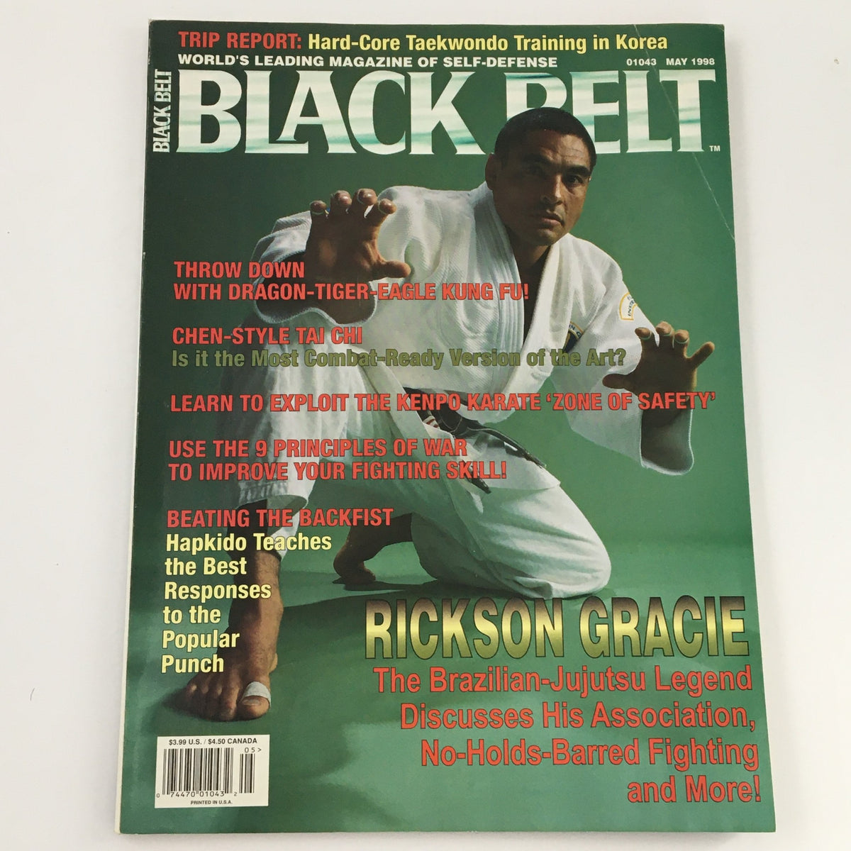 Black Belt Magazine May 1998 featuring Rickson Gracie, Brazilian Jiu-Jitsu legend, on the cover, showcasing martial arts techniques and insights.